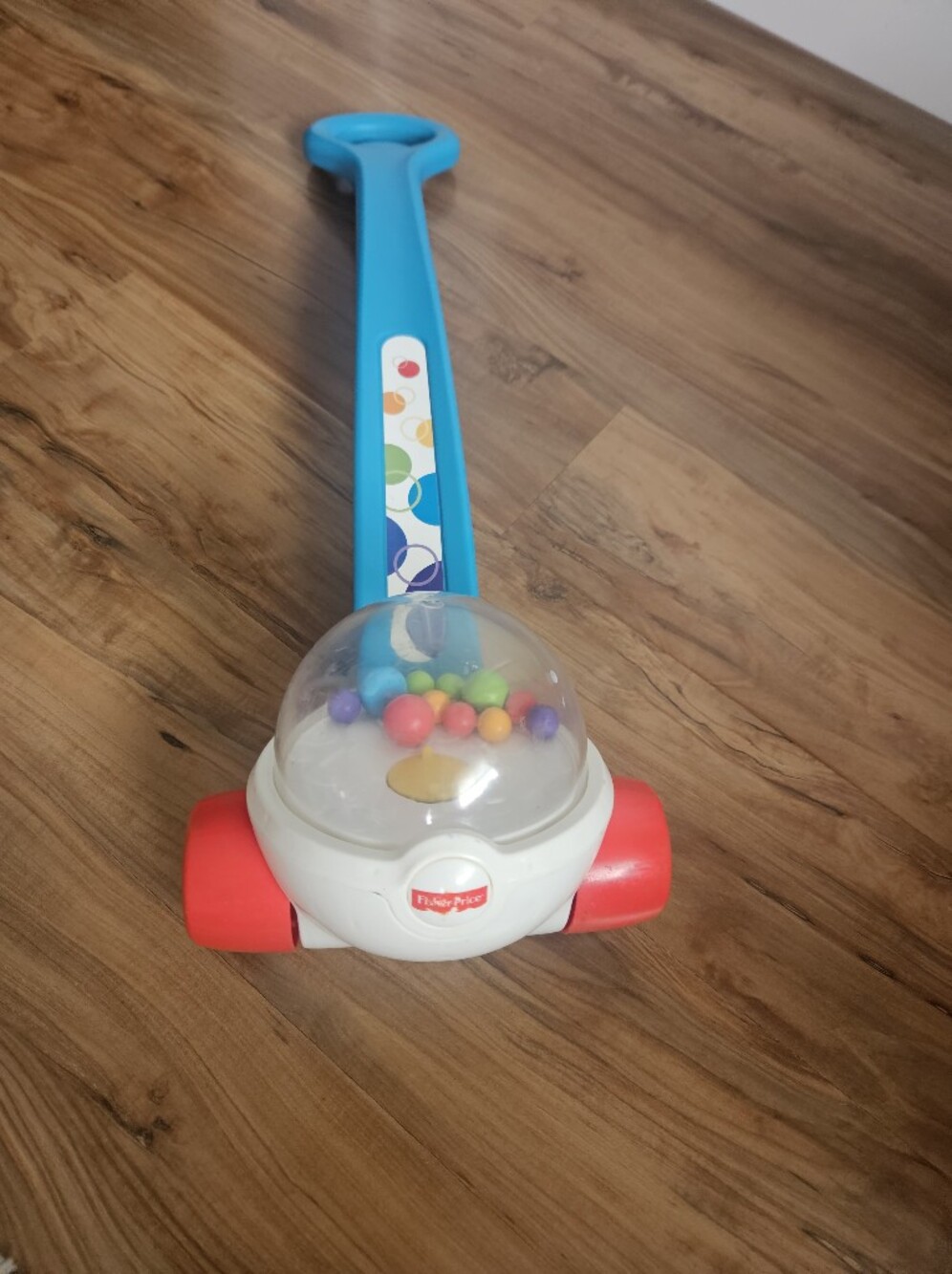 Fisher-Price Push-Along Walker with Blue Handle and Red Wheels
